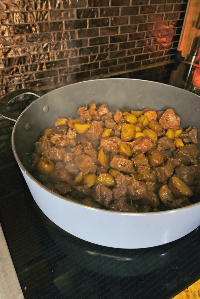 Delicious garlic butter steak with tender potatoes, perfect for a hearty meal.