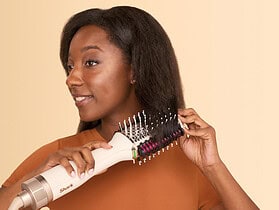Brosse lissante pour cheveux crépus