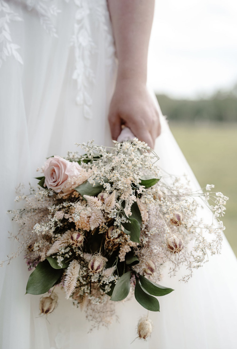 elegant wedding flowers bouquet held by dorset bride