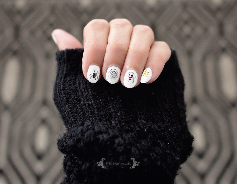 Great idea! Printable nail art using Halloween themed emojis!