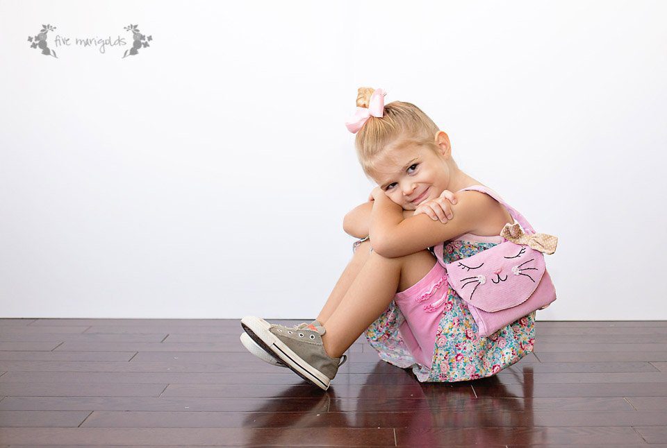 Upcycle your baby clothes with this pants - to - kitty cat purse refashion tutorial.