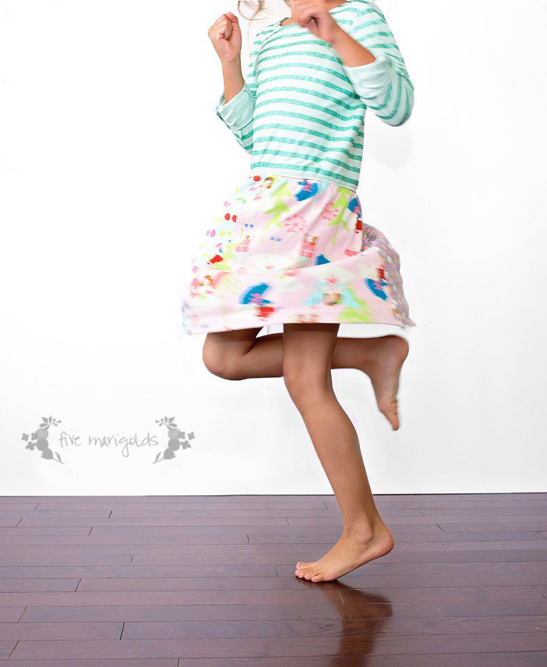 Such a good idea! Refashion upcycled T-shirts to create a custom knit dress for little girls. Upcycled t-shirt dress tutorial| Five Marigolds