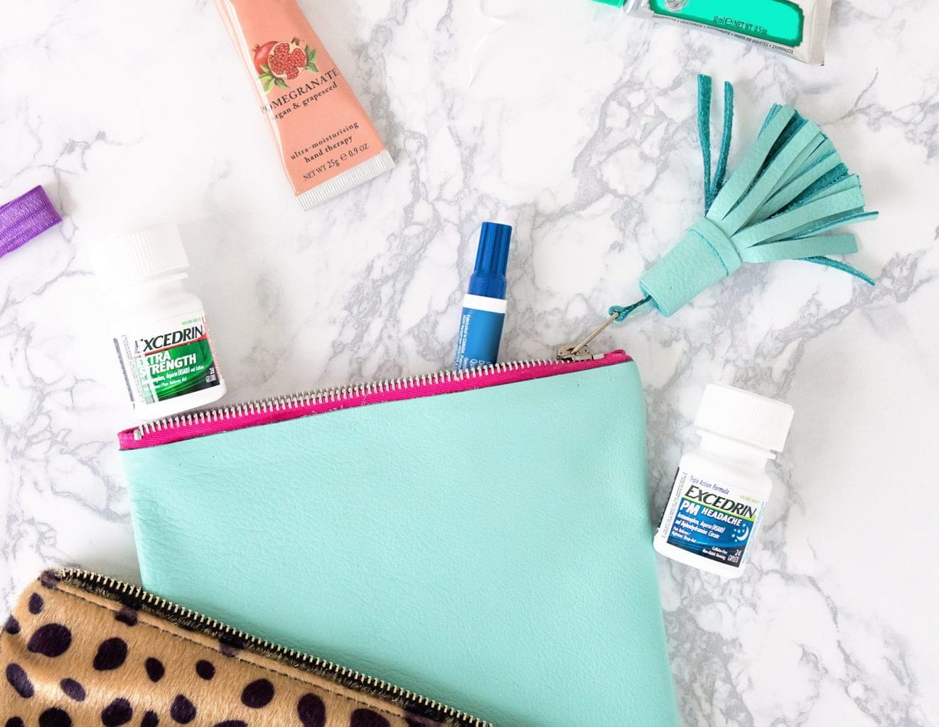 Make a no-sew leather clutch with tassel in just 15 minutes! #ad #MoreMomentsWithExcedrin