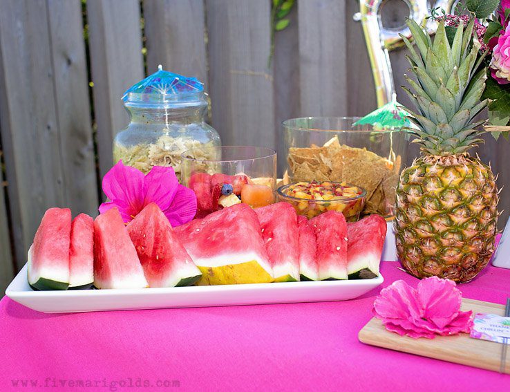 Chill and grill for a laid back summer barbecue. Tutorial for turning a dollar store tablecloth into a custom memory blanket for gatherings. Free printable favor tags for sparklers.