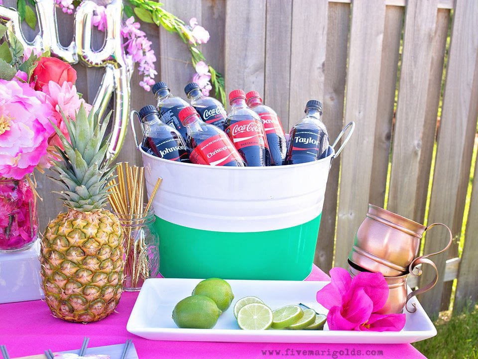 Chill and grill for a laid back summer barbecue. Tutorial for turning a dollar store tablecloth into a custom memory blanket for gatherings. Free printable favor tags for sparklers. 