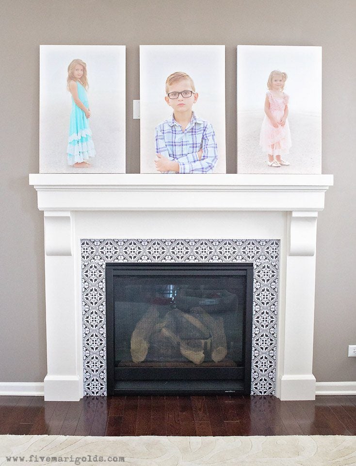 Tips for creating a beautiful and comfortable living space on a budget: custom photo canvases, faux mosaic tile and vintage fabrics and prints.
