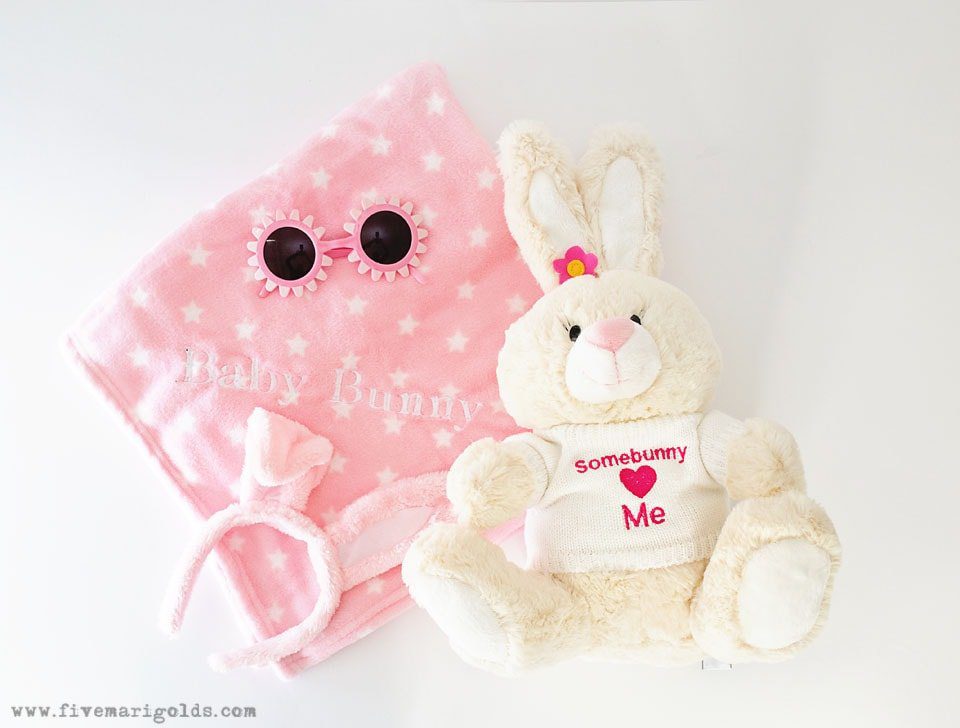 Stuffed bunny with some bunny loves you embroidered on sweater. No Candy Easter Basket