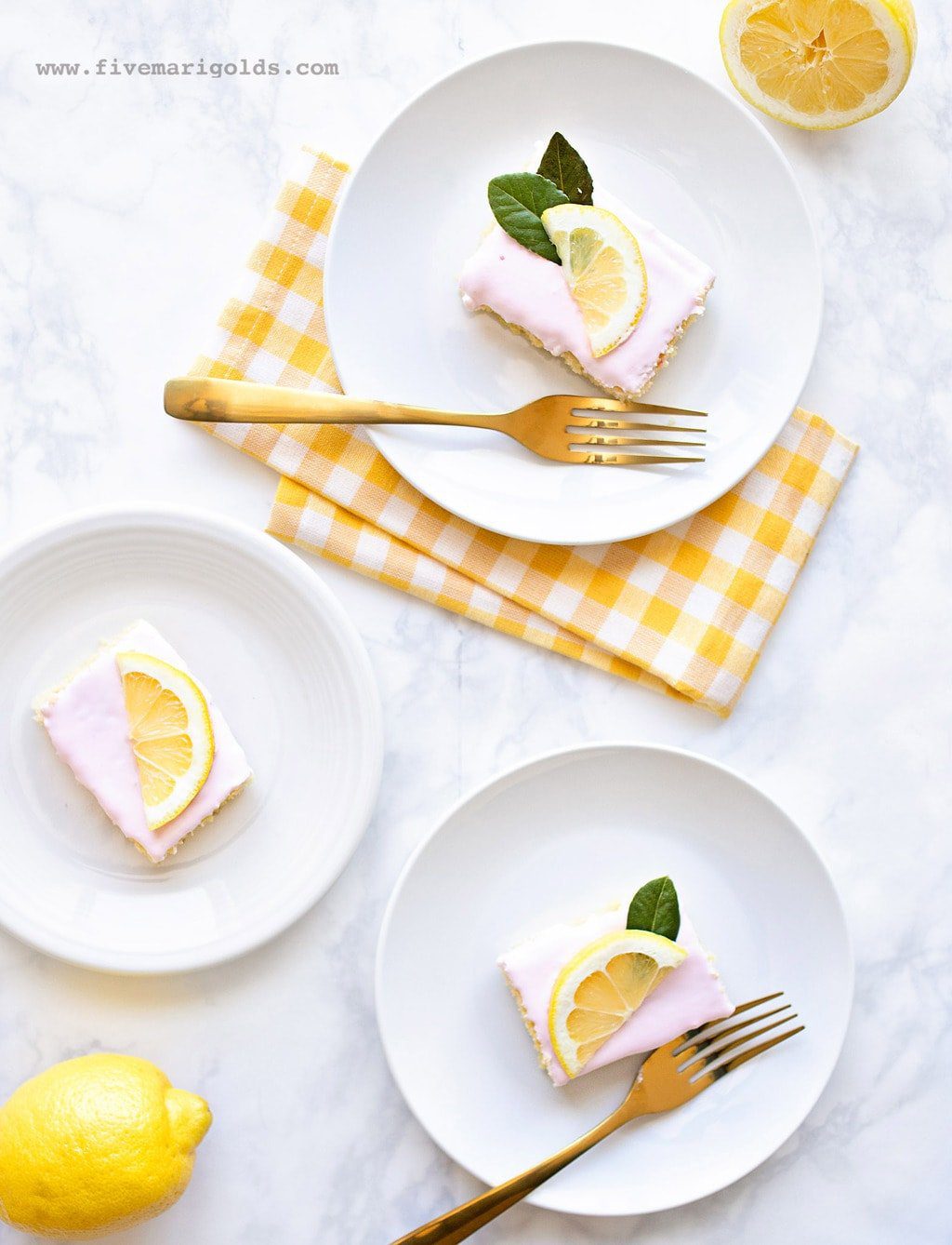 Sheet Cake with pink frosting and lemon slices