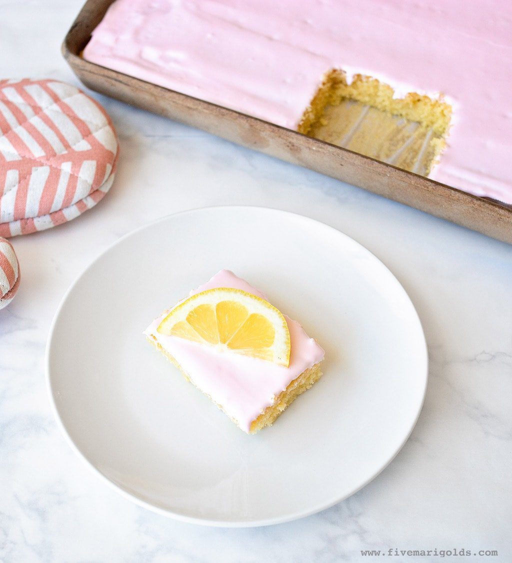 Sheet Cake with pink frosting and lemon slices