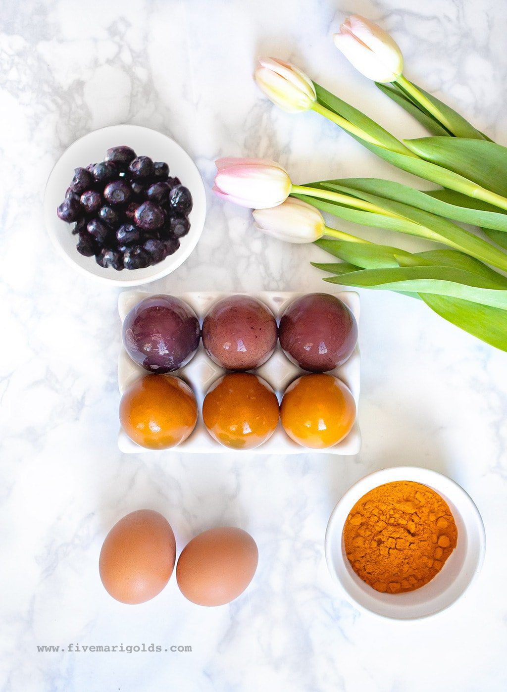 Naturally dye brown easter eggs with blueberries and turmeric