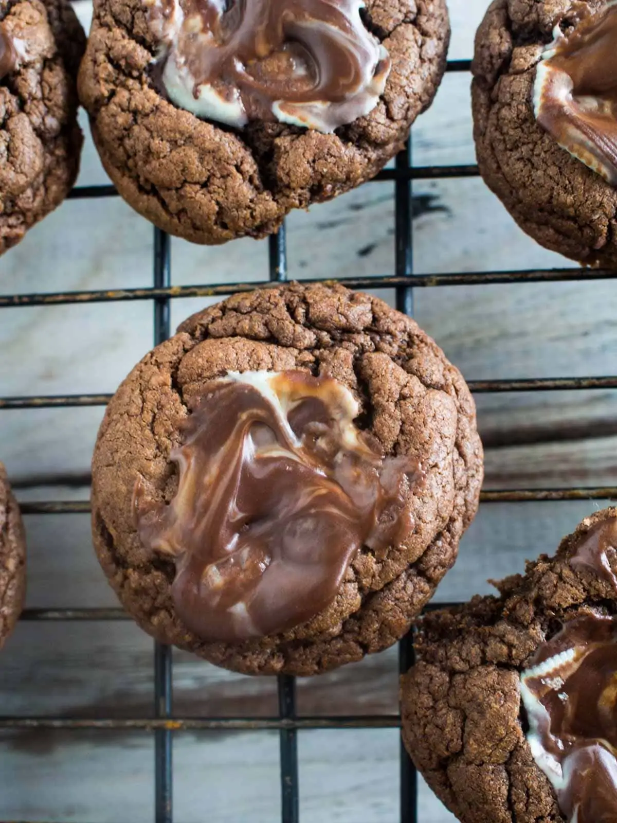 Andes Mint cookies on cooling rack with chocolate in center