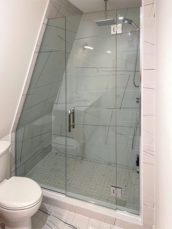 project fort showers angled wall custom frameless chrome swing wall to wall