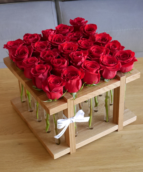 Red roses in a wooden premium box - flowers in a box