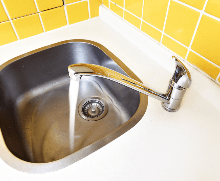 pour hot water in sink