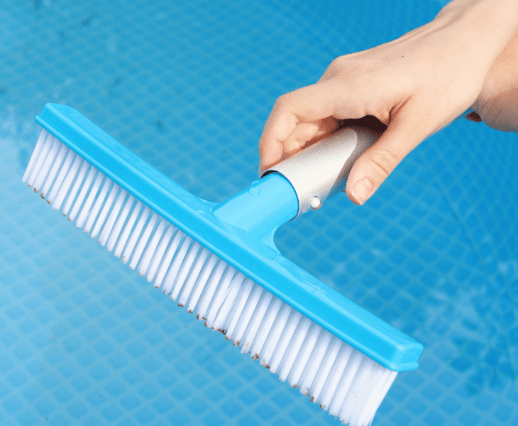 attach the pole to brush