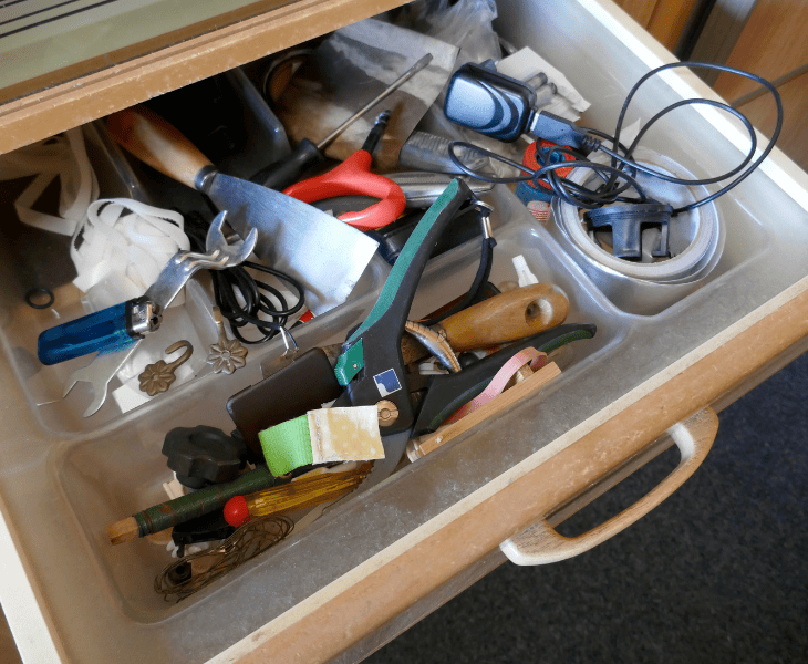 drawer with full of stuffs