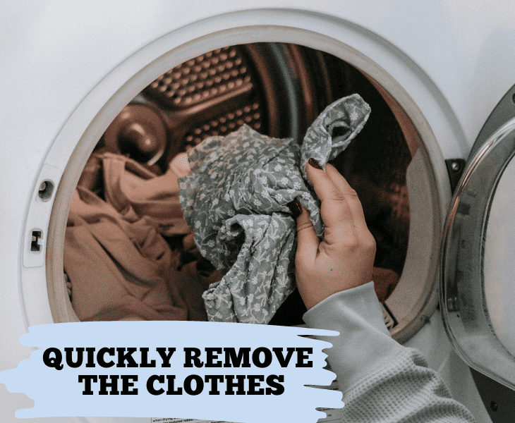 taking out the clothes from washing machine