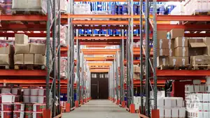 Efficient warehouse storage with organized shelves and boxes for logistics.