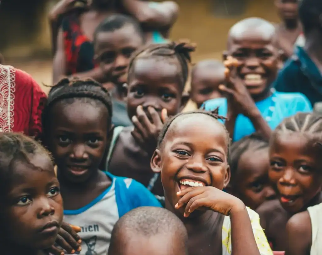 Children participating in a charity event promoting education and well-being.