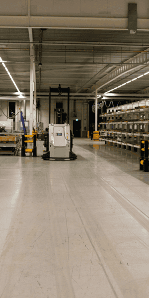 Automation robot in a warehouse for commercial analytics transformation.