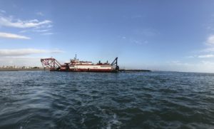 A dredging vessel at work in Channel Islands Harbor