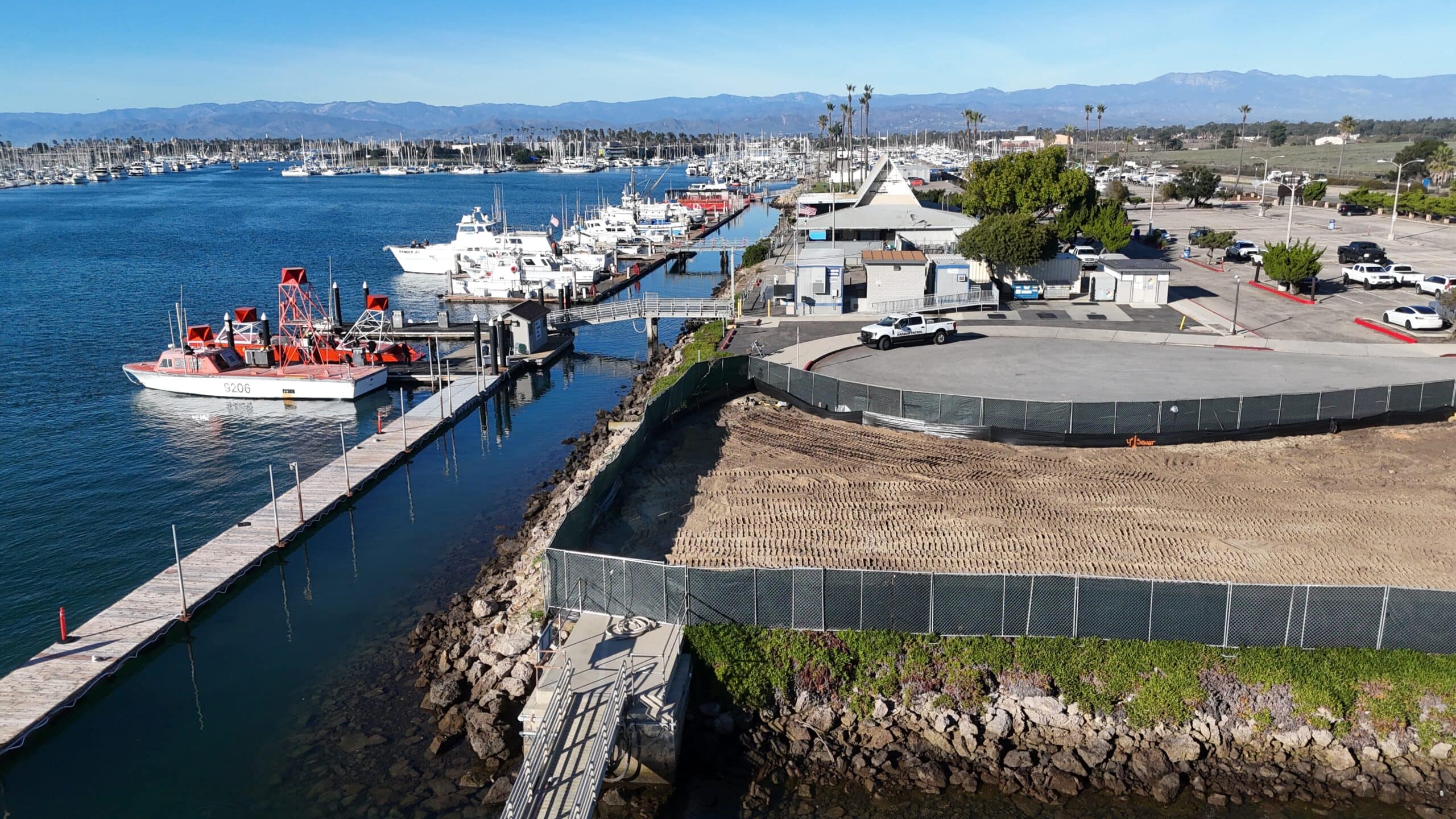 View of Channel Islands Harbor marina with boats, docks, and surrounding waterfront.