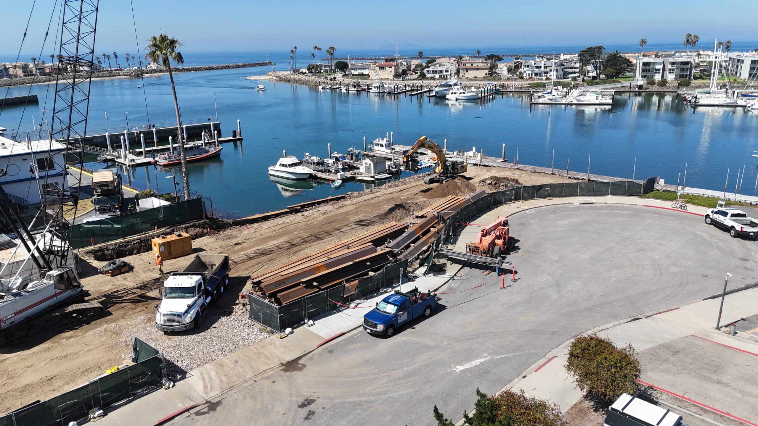 Aerial view of Channel Islands Harbor marina with boats and construction site.