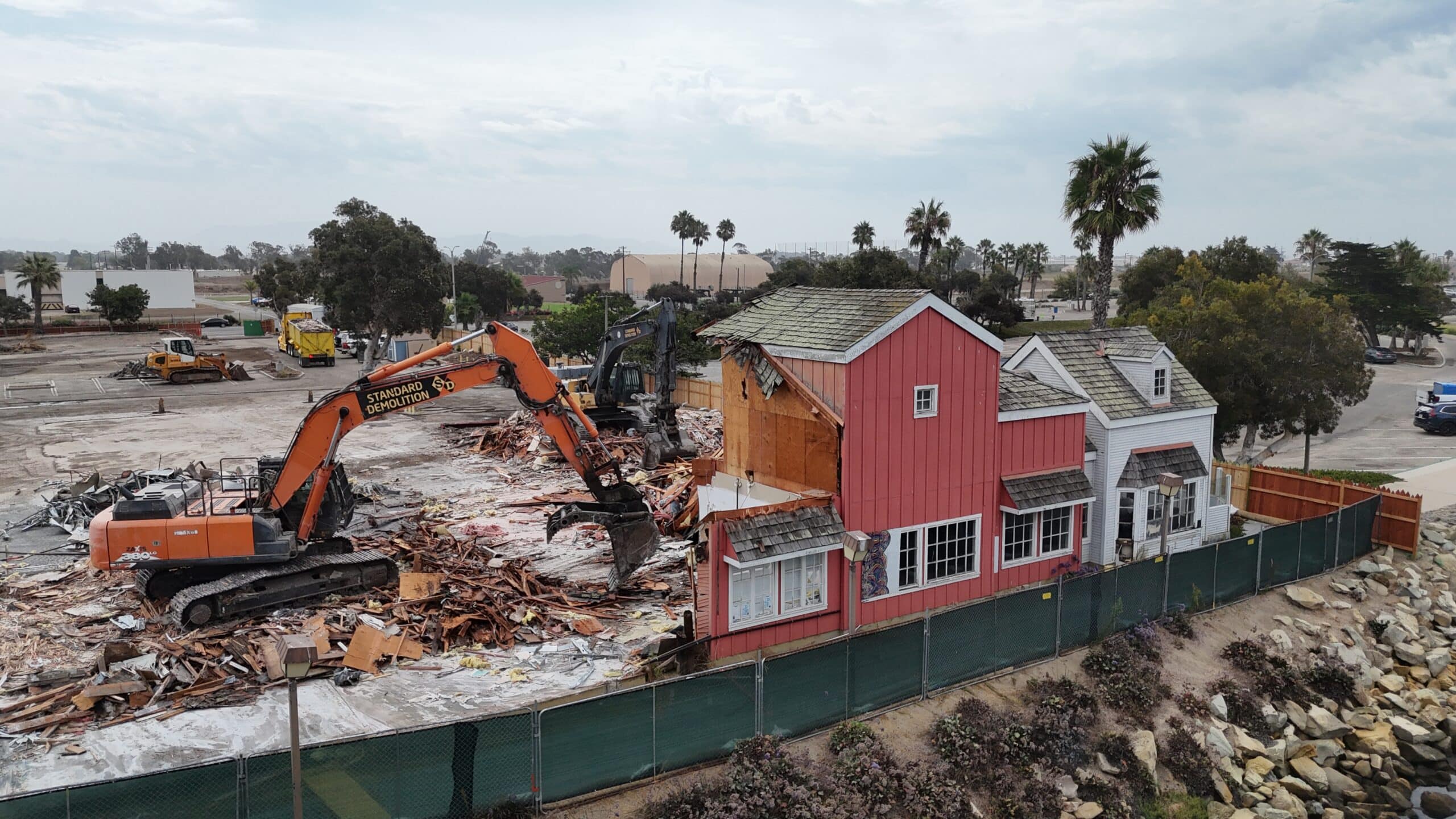 Construction equipment demolishing building near Channel Islands Harbor.
