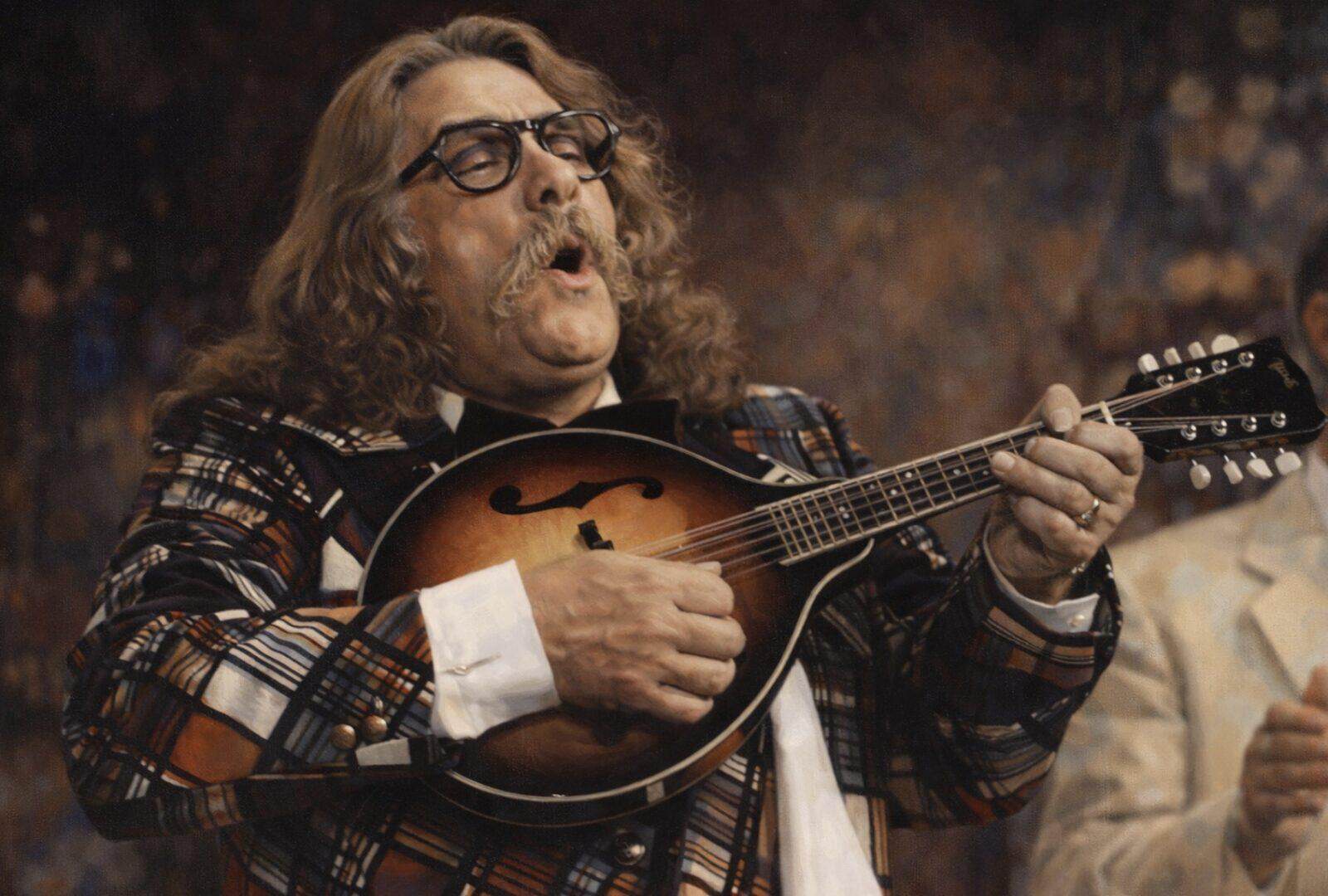 Hans Süper spielt auf seiner Flitsch bei Karneval in Köln.