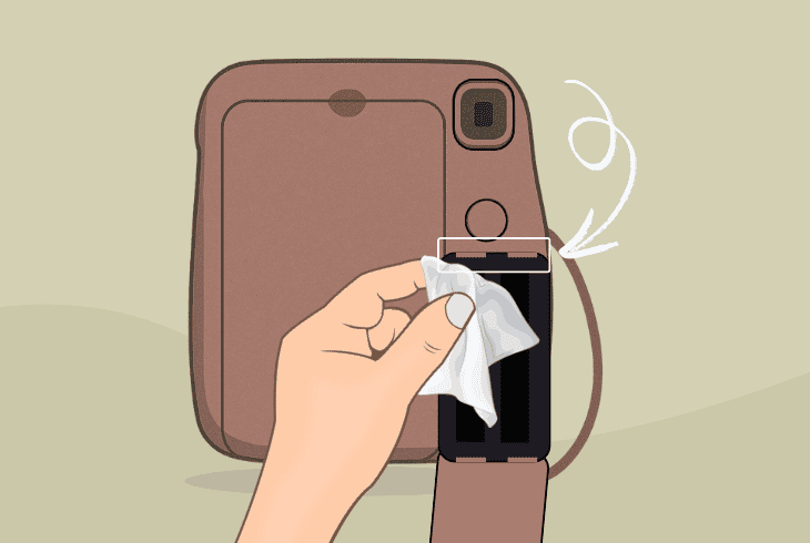 Instax Mini 12 Not Working? (Don’t Panic, Try This First!) 5 clean the battery compartment contacts