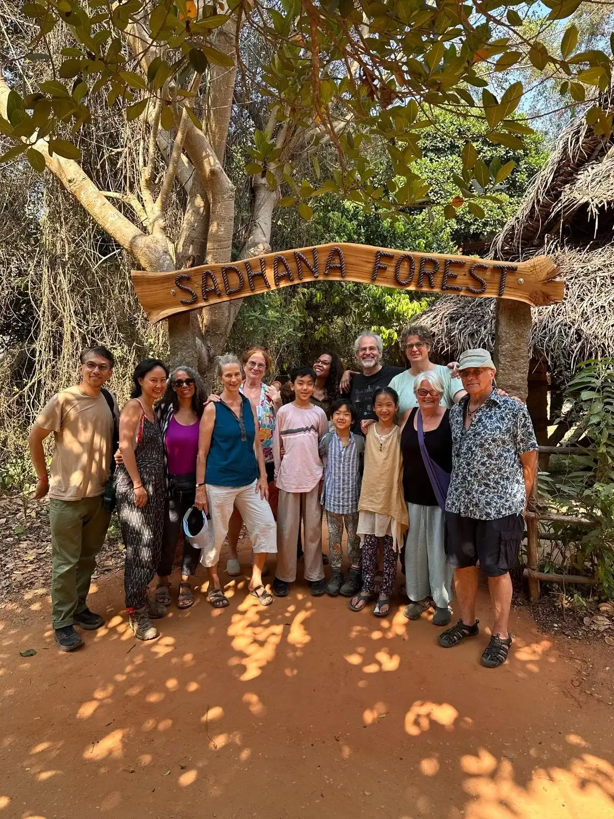 India-2-Group-under-Forest-Sign.webp
