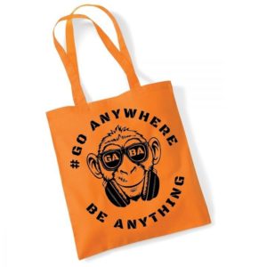 Durable orange cotton tote bag with "Go Anywhere" monkey graphic and headphones, perfect for casual.
