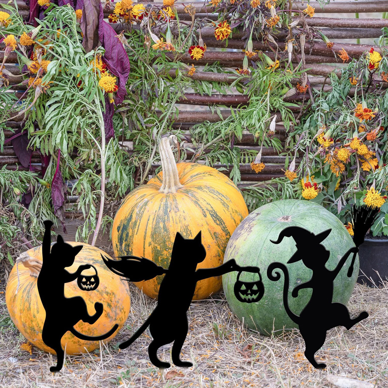 three marching cat garden stakes