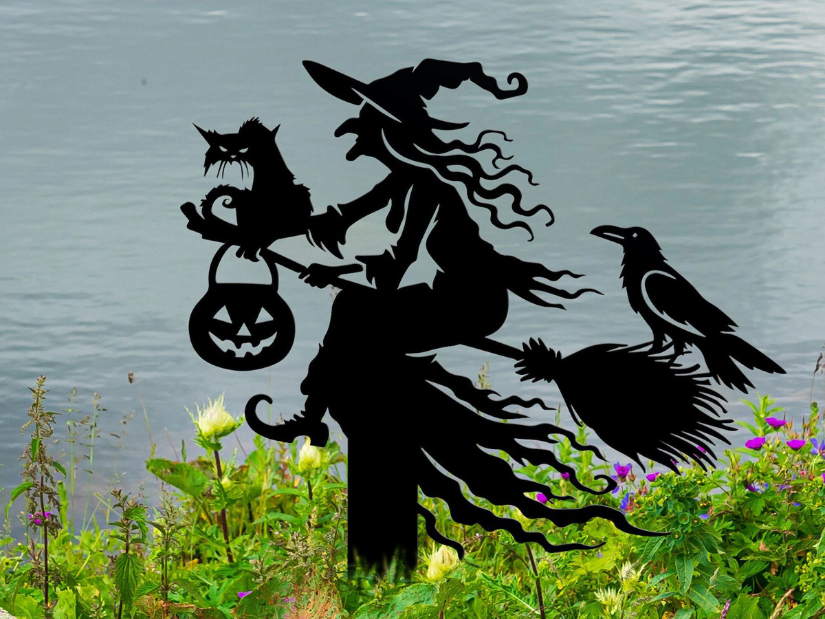 witch on a broomstick with cat and crow metal stake