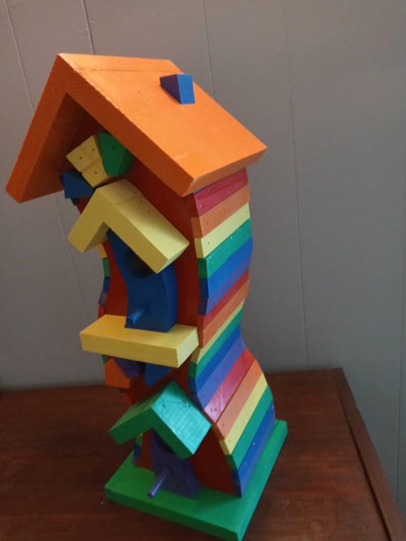 crooked wood two story birdhouse rainbow colored