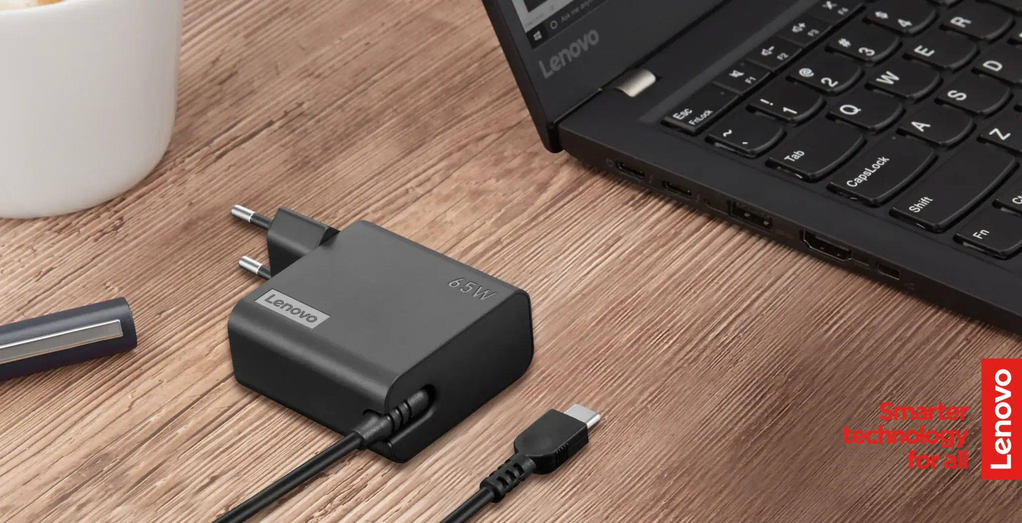 מטען קיר USB-C 65W מתכוונן של Lenovo לחיבור נוח ומהיר למחשבים ניידים, כולל אפשרות התאמה אישית לטעינה אופטימלית. מתאים לשימוש יומיומי ולנסיעות.