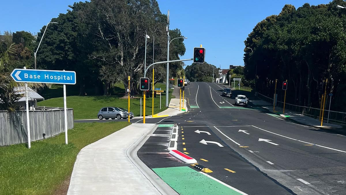 New Zealand traffic lights and road signs at an intersection near Base Hospital.