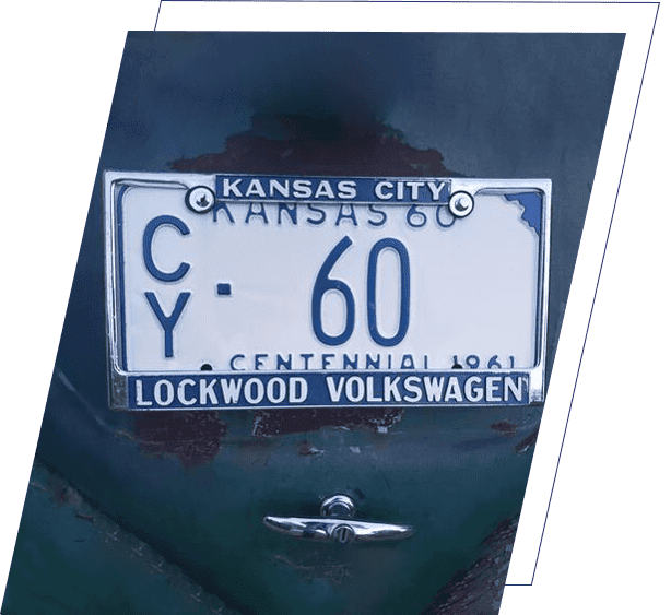 A close up of the license plate on a car