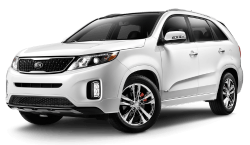 White Kia Sorento SUV parked, showcasing modern design and features.