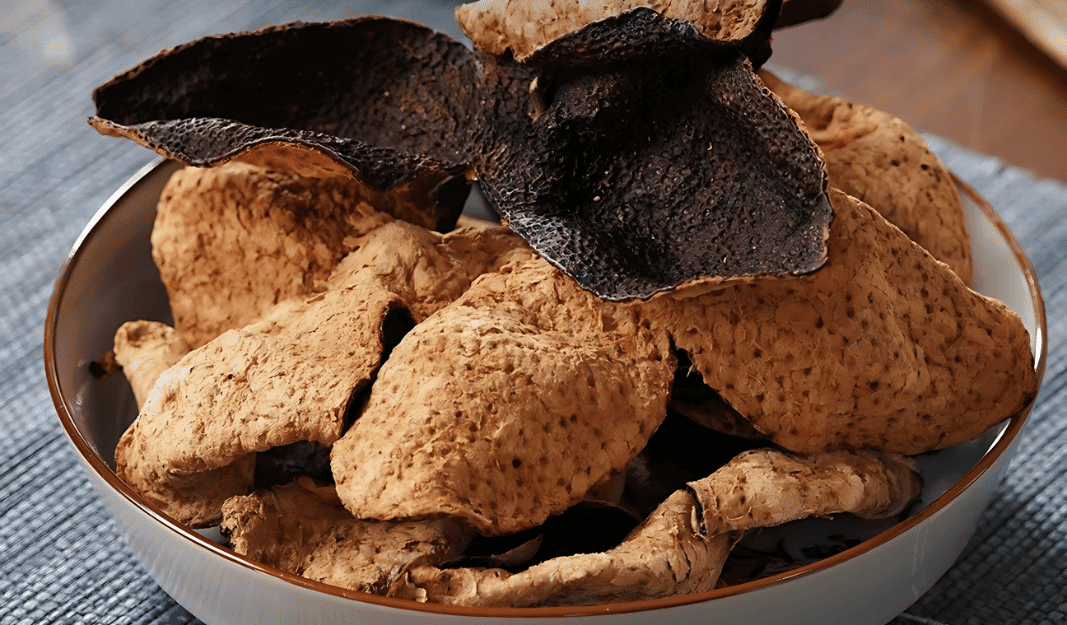 Close-up of Xinhui Chenpi, traditional aged dried tangerine peel from Xinhui, in the Wuyi region