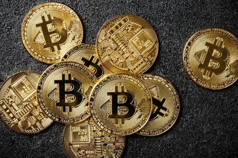 Bitcoin coins on black background