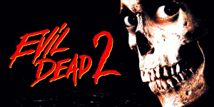 Promotional poster for Evil Dead 2 featuring a skull-faced character and the movie title.