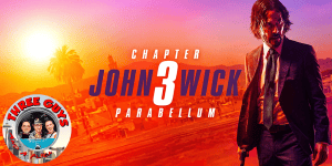John Wick Chapter 3 Parabellum poster with Keanu Reeves in a suit at sunset.