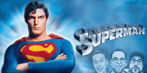 Superman with podcast hosts promoting the movie review show.