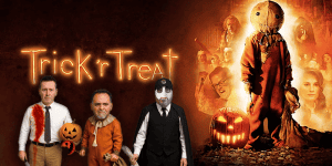 Group of people dressed in Halloween costumes, including a pumpkin-headed figure and a masked indivi.