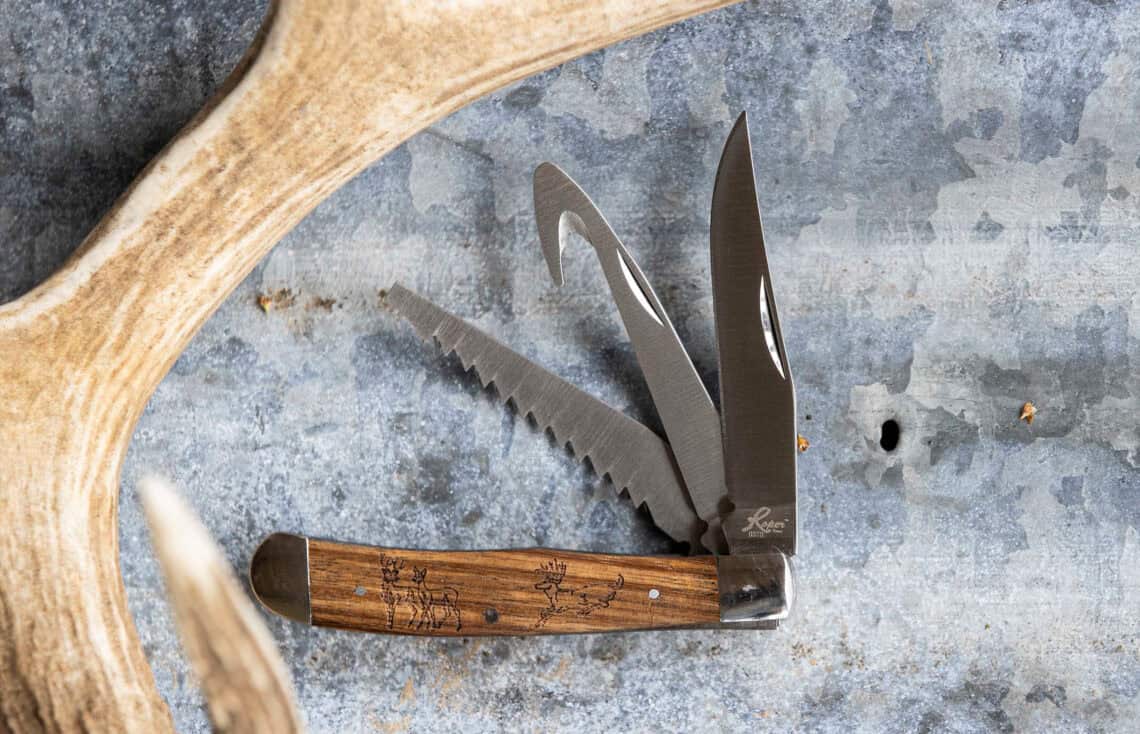 Roper multi-blade folding pocket knife with a polished master blade, saw tool, and gut hook. Traditional design by ABKT.