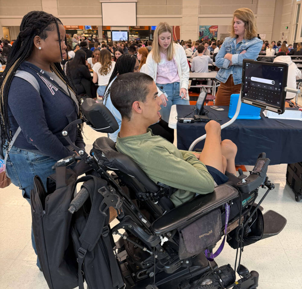 Hank Poore using a wheelchair with assistive technology