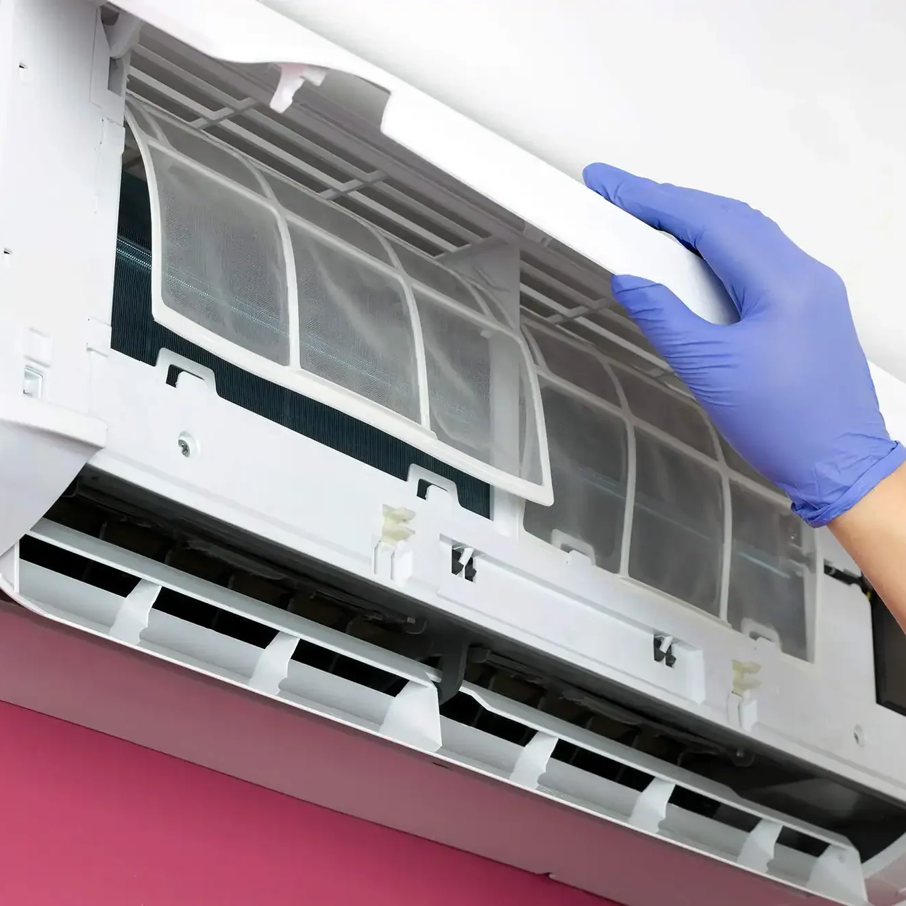 Gloved-Hand-Cleaning-AC-Filter