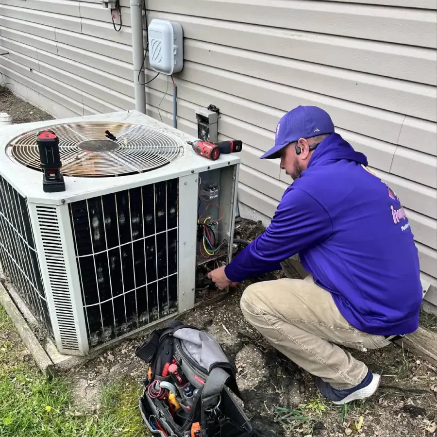 HVAC-Technician-Repairing-Outdoor-Air-Conditioning-Unit-Service
