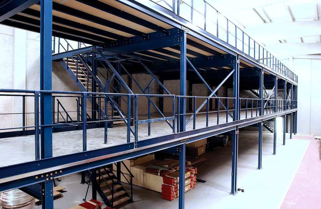 Industrial steel mezzanine for storage and workspace solutions.